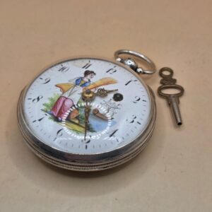 Montre oignon a décor de navire et de paysan