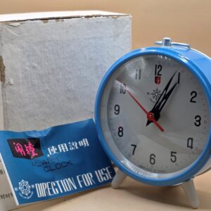 Réveil bleu Helm Brand avec boite et document